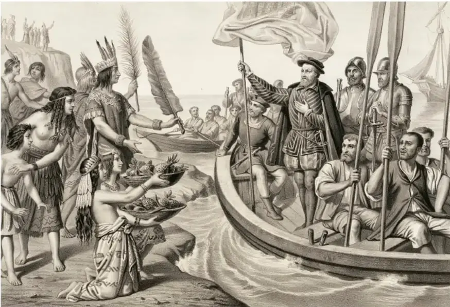 Grabado en blanco y negro que representa el desembarco de Hernán Cortés y sus soldados desde una embarcación, recibidos por indígenas que les ofrecen alimentos y presentes en la costa.