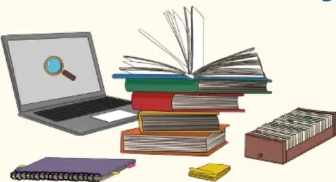 Laptop, libros y cuaderno