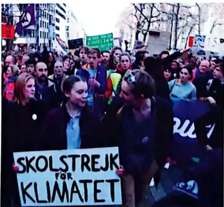 Manifestación con cartel 'SKOLSTREJK FÖR KLIMATET' (Greta Thunberg)