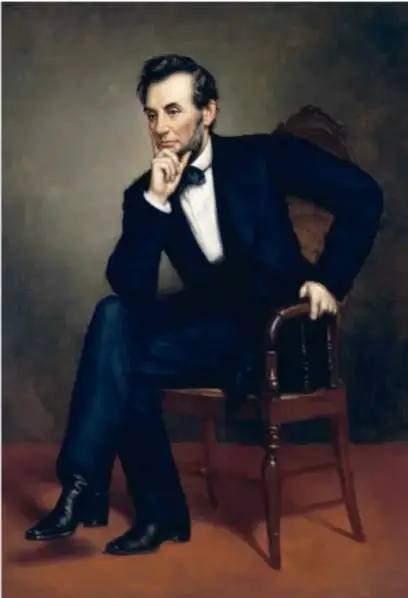 Retrato de Abraham Lincoln sentado en una silla, con traje oscuro y moño, en actitud pensativa.