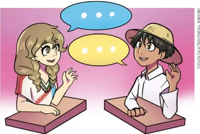 Ilustración de dos estudiantes (una niña rubia y un niño con gorra) conversando tras sus escritorios, cada uno con un globo de diálogo que contiene tres puntos, lo que simboliza el intercambio de ideas y argumentos.
