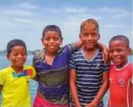 Fotografía de cuatro niños afroecuatorianos de Esmeraldas.