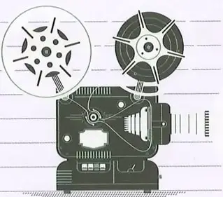 Ilustración de un proyector cinematográfico vintage con dos carretes de película, de estilo retro en blanco y negro/gris oscuro. Imagen decorativa que acompaña el espacio de escritura del ejercicio 11. Crédito: Shutterstock (2020) 257125578.