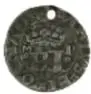 Fotografía del anverso de una moneda de plata Carlos y Juana, 1/2 Real, México, diámetro 18 mm, Colección Casa de Moneda de México, Museo Numismático Nacional.