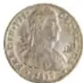 Fotografía del anverso de una moneda de plata: Moneda Realista, Fernando VII, 8 Reales, México, 1812, del Museo Numismático Nacional.