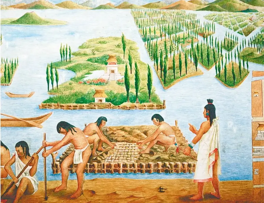 Ilustración de chinampas: varios indígenas trabajan sobre una plataforma de cañas y tierra en el lago, mientras otro personaje con manto blanco observa. Al fondo hay islotes con árboles, un templo y canoas.