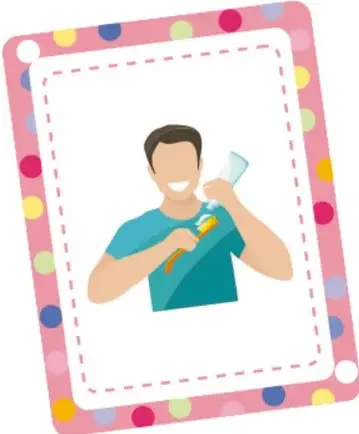 Tarjeta rosa con puntos de colores que muestra a una niña lavándose las manos en un lavabo.