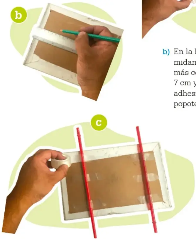 Mano midiendo con lápiz sobre la base de la caja.