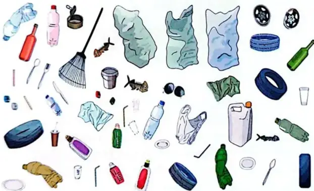 Conjunto de residuos y objetos contaminantes, como botellas, plásticos, latas, vidrios y llantas.
