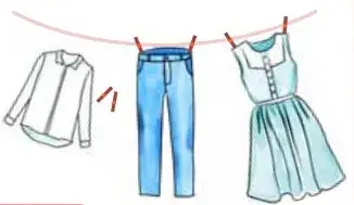 Ropa colgada en un cordel: camisa, pantalón y vestido.