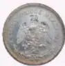 Fotografía del anverso de una moneda de cincuenta centavos de México, 1906, de plata, con ficha de museo.