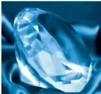 Diamante azul facetado sobre fondo oscuro.