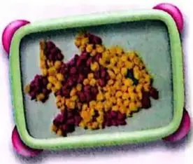Ejemplo visual de un pez elaborado con bolitas de papel.