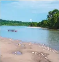 Fotografía de un río, relacionada con la sedimentación de materiales erosionados en cauces bajos y hondonadas.