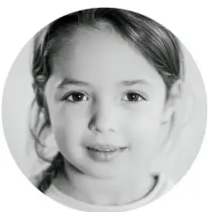 Retrato circular de una niña que representa al grupo 1° B.