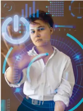 Fotografía de una joven interactuando con una interfaz holográfica de datos y gráficos, representando la innovación tecnológica y la comunicación de datos.