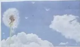 Fotografía de un diente de león soplado por el viento con sus semillas volando.