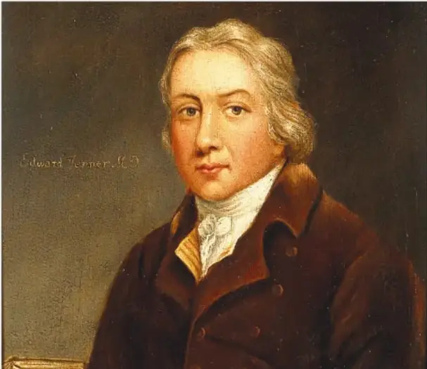 Retrato al óleo de Edward Jenner, hombre de peluca blanca y saco marrón, con la firma pintada en el lienzo.