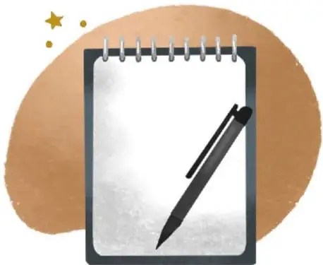 Cuaderno de notas con un bolígrafo, sobre fondo marrón.
