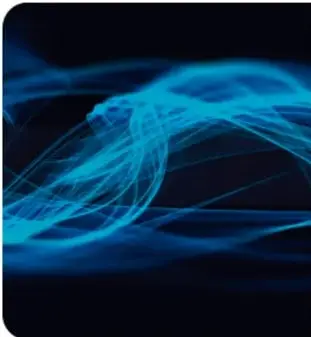 Imagen artística de fibras o hilos luminosos de color azul sobre fondo negro, alusiva a la energía eléctrica.